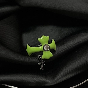 Detail view of a luxury zircon-encrusted butterfly open ring on black silk background