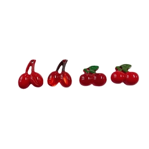Set of four red acrylic cherry pendants with leaf details for DIY jewelry making