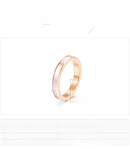 Macro detail of 3mm rose gold stainless steel ring with white shell inlay feature