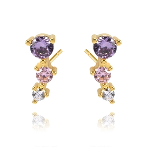 Elegant gold earrings with purple, pink and clear zircon crystals on white background