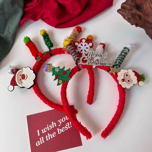 Detail of Christmas headband with Santa Claus, Xmas tree and Merry Christmas plaque