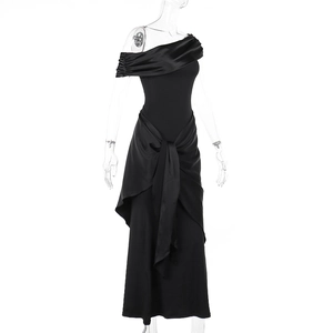 Detail of elegant black off-shoulder satin gown with waist knot and pleated texture