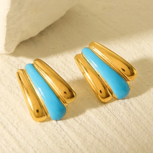 Macro detail of sky blue enamel drop on minimalist 18k gold plated stainless steel earring