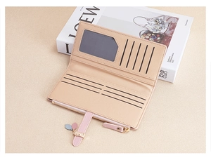 Dettaglio portafoglio lungo rosa con fessure per carte e tasca per monete con zip