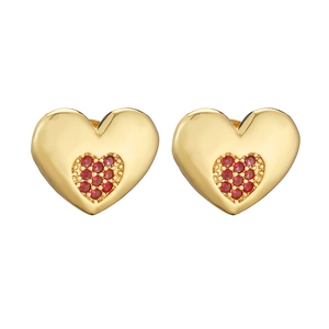 Detailed view of heart-shaped gold earrings with micro-set red zircon stones