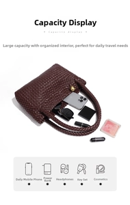 Detail shot showing large capacity of woven leather tote bag with daily essentials inside