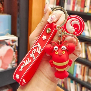 Creative red cartoon lobster keychain with silicone hand strap and rich man lettering