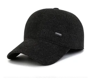 Detail view of winter woolen baseball cap with Fashion Sports metal emblem and thick fabric