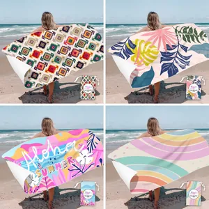 Quick-dry microfiber beach towel set with tropical prints and matching storage bags