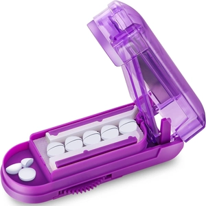 Portable purple pill cutter with stainless steel blade for precise medication splitting