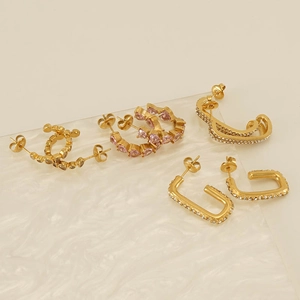 Collection of 18k gold earrings featuring pink heart zircon and sparkling crystal inlay