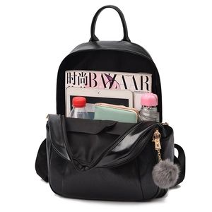 Black PU leather backpack for women showing spacious interior with tablet and accessories