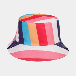Close-up of vibrant rainbow striped fabric and fine stitching on the reversible bucket hat