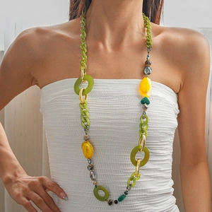Bohemian chunky acrylic statement necklace with colorful resin beads and golden rings