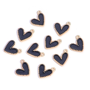 Detailed view of ten heart-shaped black enamel pendants with golden metal borders