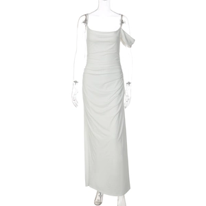 Detail of white asymmetric one-shoulder dress with elegant side ruched fabric folds