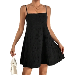 Elegant black A-line mini dress with spaghetti straps and textured bubble fabric