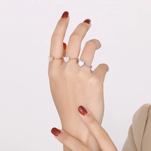 18k gold plated stainless steel open rings with white shell heart on model hands