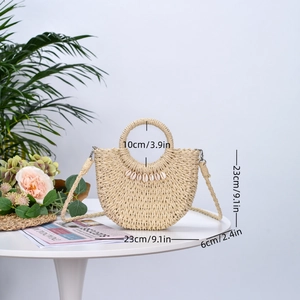 Detail shot of straw bag with shell decor and dimensions 23cm height 6cm width