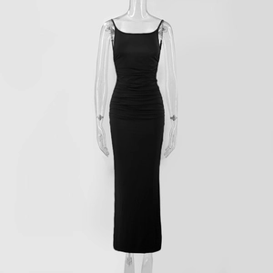 Detailed view of black bodycon maxi dress featuring ruffled textures and slim fit design