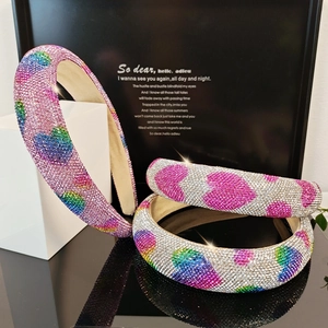 Sparkling rhinestone sponge headbands with heart patterns in pink and silver colors