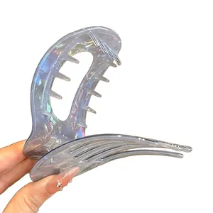 Elegant holographic blue acetate hair claw clip with iridescent finish for women