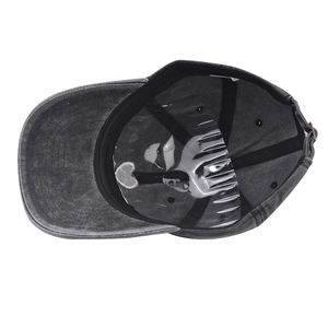 Detail of grey washed cotton baseball cap interior with internal stitching and shape support