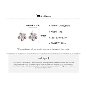 Detail view of flower stud earrings showing 1.2cm size and copper zircon material