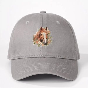 Detailed close-up of grey cotton baseball cap with embroidered horse and flower design