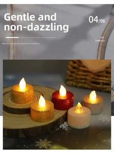 Macro shot of glittery LED tea lights on a wooden base with warm yellow glow