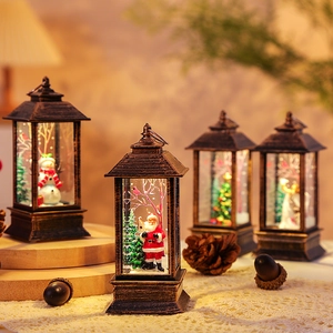 Set of 4 vintage LED Christmas lanterns with Santa, Snowman, and Angel scenes