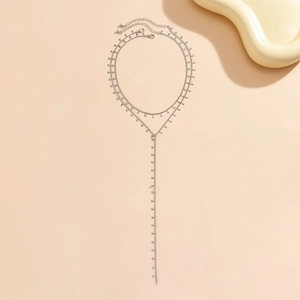Detail view of silver multi-layer Y-shaped necklace with drop pendants and lobster clasp