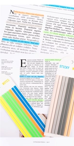 Close-up of colorful PET index tabs on book page for clear highlighting and marking