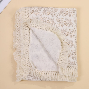 Muslin cotton baby swaddle blanket with fringe tassels and vintage floral print