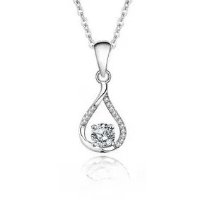 Macro detail of S925 sterling silver waterdrop pendant with moissanite and micro-pave diamonds