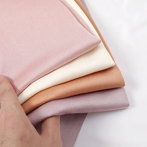 Silk-feel satin hijab scarves in soft pink, beige, bronze, and mauve color variants