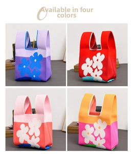 Detail view of colorful floral knit bags in purple, red, pink and orange colors