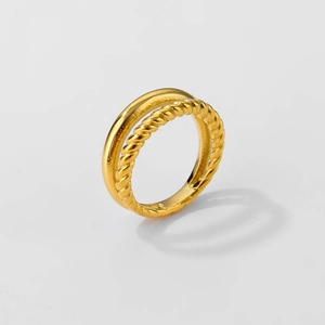 Golden double-layer ring featuring a smooth band and twisted rope texture design