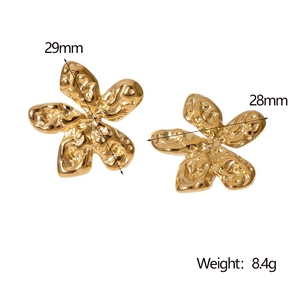 Macro shot of gold floral earrings with 29mm size and weight specs on white background