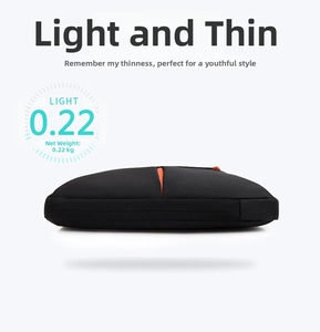 Slim black laptop sleeve with orange interior detail weighing only 0.22kg