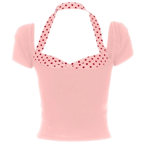 Détail du haut rose dos nu avec motifs à pois rouges et épaules dénudées