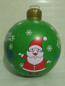 Detail of a 60cm green inflatable Christmas ball with Santa Claus and snowflakes