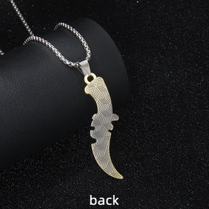 Punk grim reaper scythe necklace with two-tone silver and gold blade pendant, back view