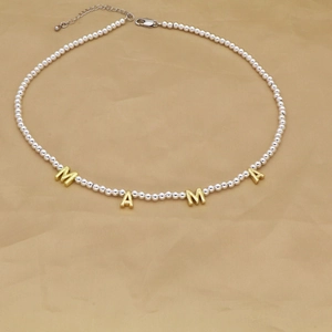 Silver beaded necklace with golden MAMA letter pendants and lobster clasp closure