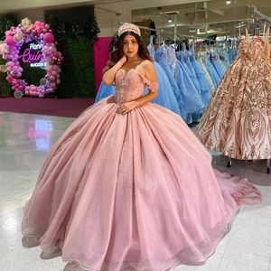 Pink off-shoulder ball gown with heavy embroidery and sequins for Quinceañera parties