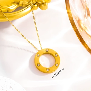 Golden 26mm round pendant necklace with CZ stones and minimalist geometric design
