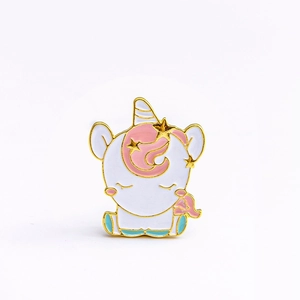 Cute white unicorn enamel pin with pink mane and golden star accents for kids and adults