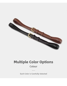 Detail shot of minimalist thin women's leather belt in black and brown, sleek and versatile.