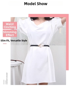 Slim black leather belt for women featuring a round gold buckle on a white dress