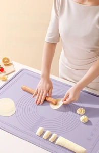 Macro detail of lavender silicone pastry mat with measurements and 230C heat resistance